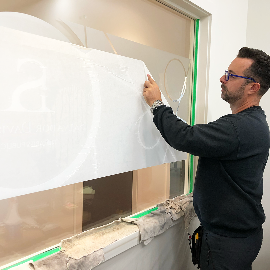 Sasa applying frosted vinyl